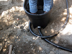 How to build a water garden pond - attach the drain pipe and the inlet pipe to the Hydro Vortex filter