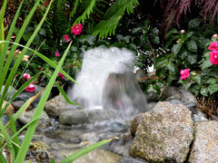 HydroFlush self-cleaning backwash system clean the small waterfall filter for you.