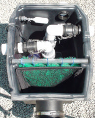 Piper HydroClean pond skimmer with both left and right outlets being used and an auto fill valve installed