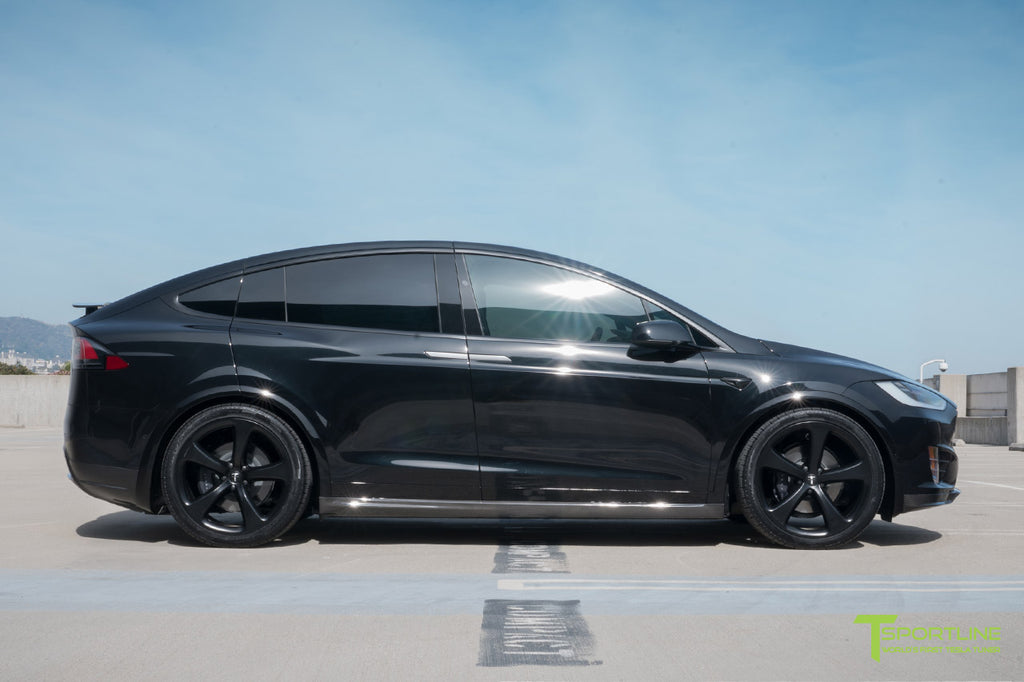 Black Model X with Painted Plastic Panels, Carbon Fiber Upgrades, and Forged Wheels