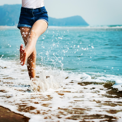 Splashing in the ocean at the beach