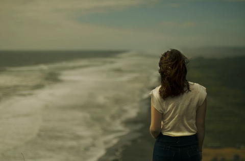 woman on stormy beach