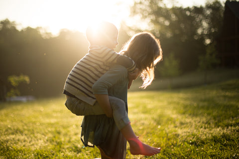 Child going to a piggy-back ride