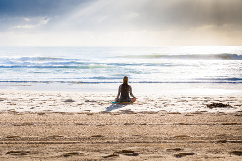 Sitting on the sand looking out into the ocean