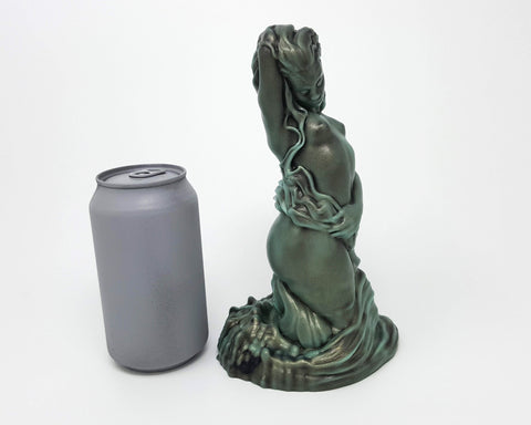 Mermaid fantasy adult toy sculpture in Deepest Wave from Lust Arts next to a silver standard soda can for scale