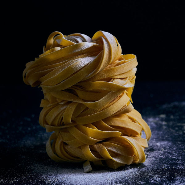 A nest of fresh pasta drying
