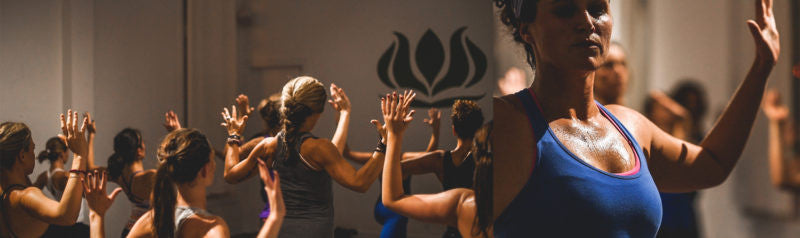 Group of woman opening their arms in yoga