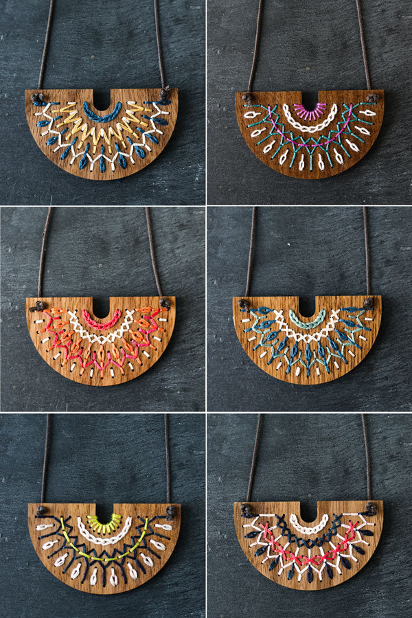 Hand embroidered wood necklace kit by Red Gate Stitchery