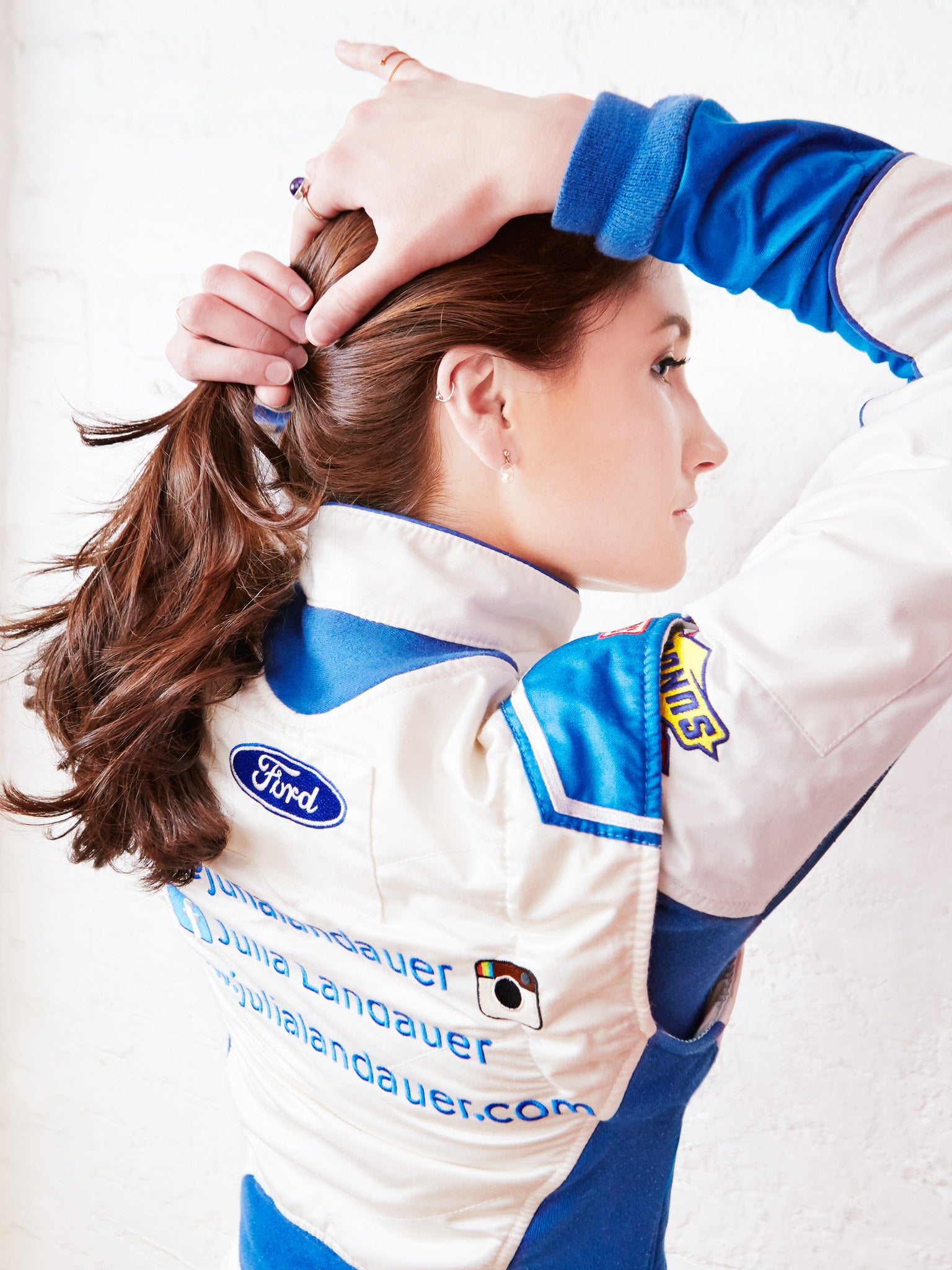 Julia landauer in racing uniform