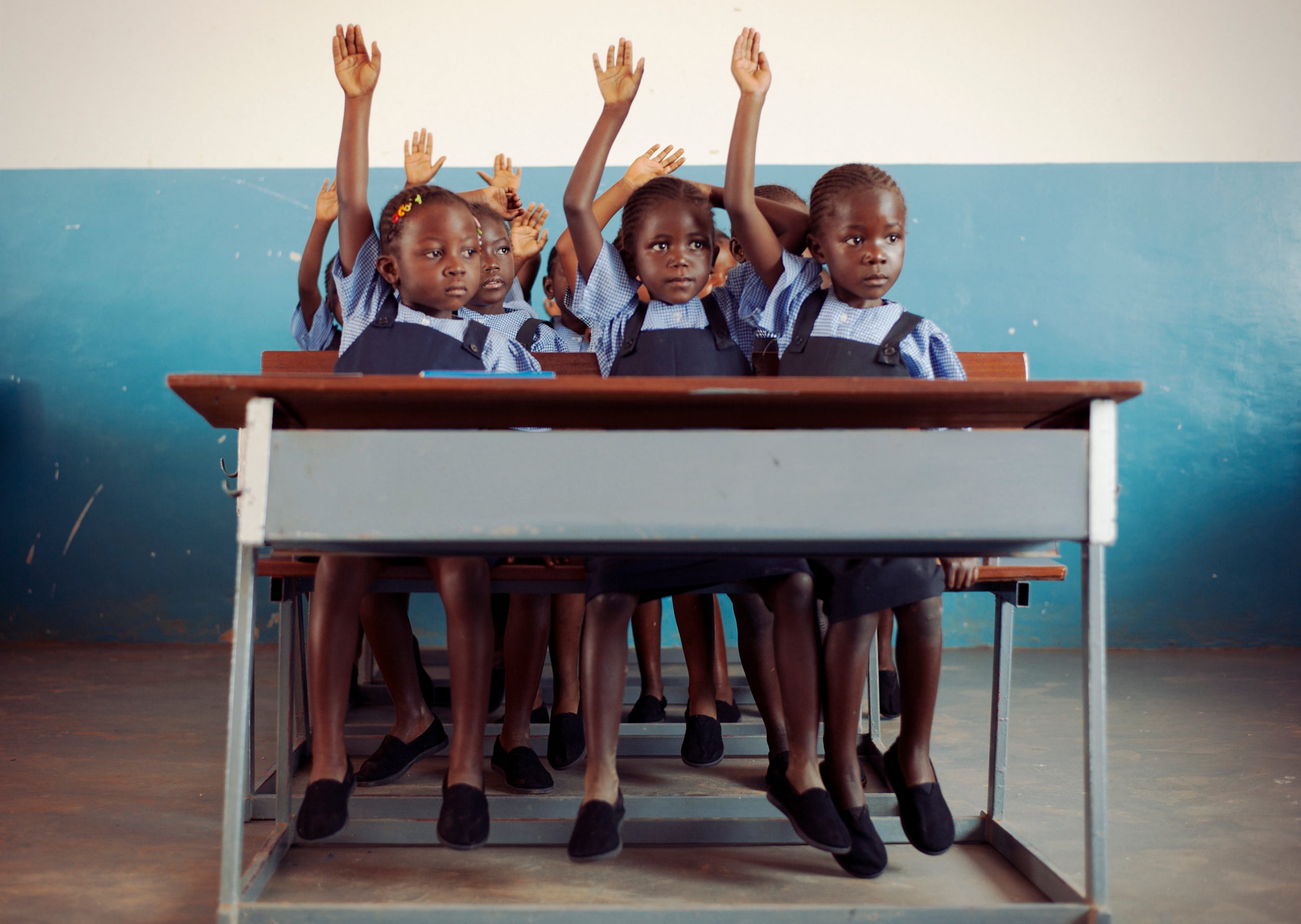 noella coursaris musunka international supermodel at malaika in drc with girls in school uniforms