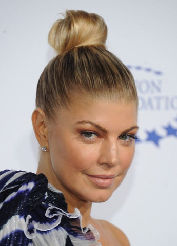 The top knot is a timeless, easy hairstyle for work. 