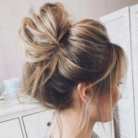 The messy bun is another pretty, easy hairstyle for thin hair.
