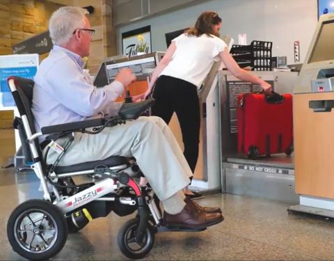 Electric Wheelchairs USA customer in wheelchair