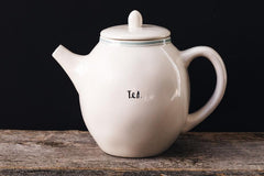 Small white teapot