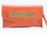 orange leather clutch with adjustable strap
