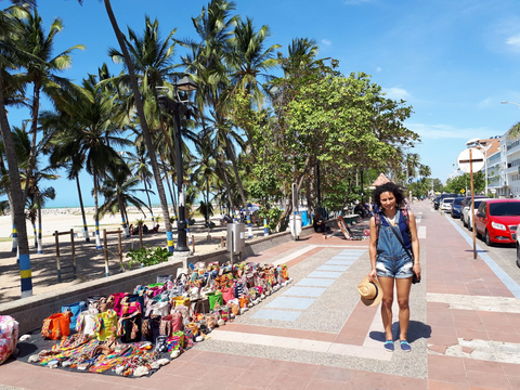 valentina pinzon, the owner of indiarts with wayuu mochila bags on streets in malecon rioacha