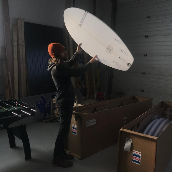 We love to receive new surfboards. Kristen captured Jeff with the late afternoon sun.