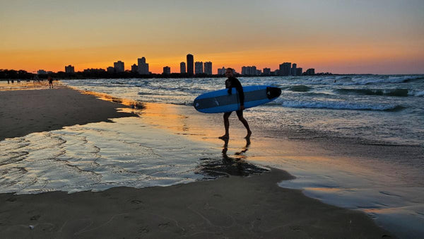 Sunset surf in Chicago, Lake Michigan. Photo by Whitney Aziz.