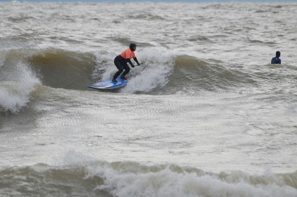 Robin Pacquing loving the lefts at The Wyldewood Gales on Lake Erie. Photo by Geoff Ortiz.