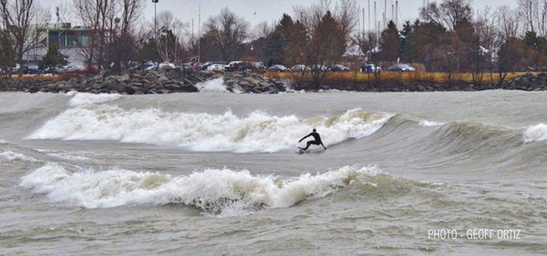Unknown surfer at Scarborough Bluffs Toronto. Photo by Geoff Ortiz.
