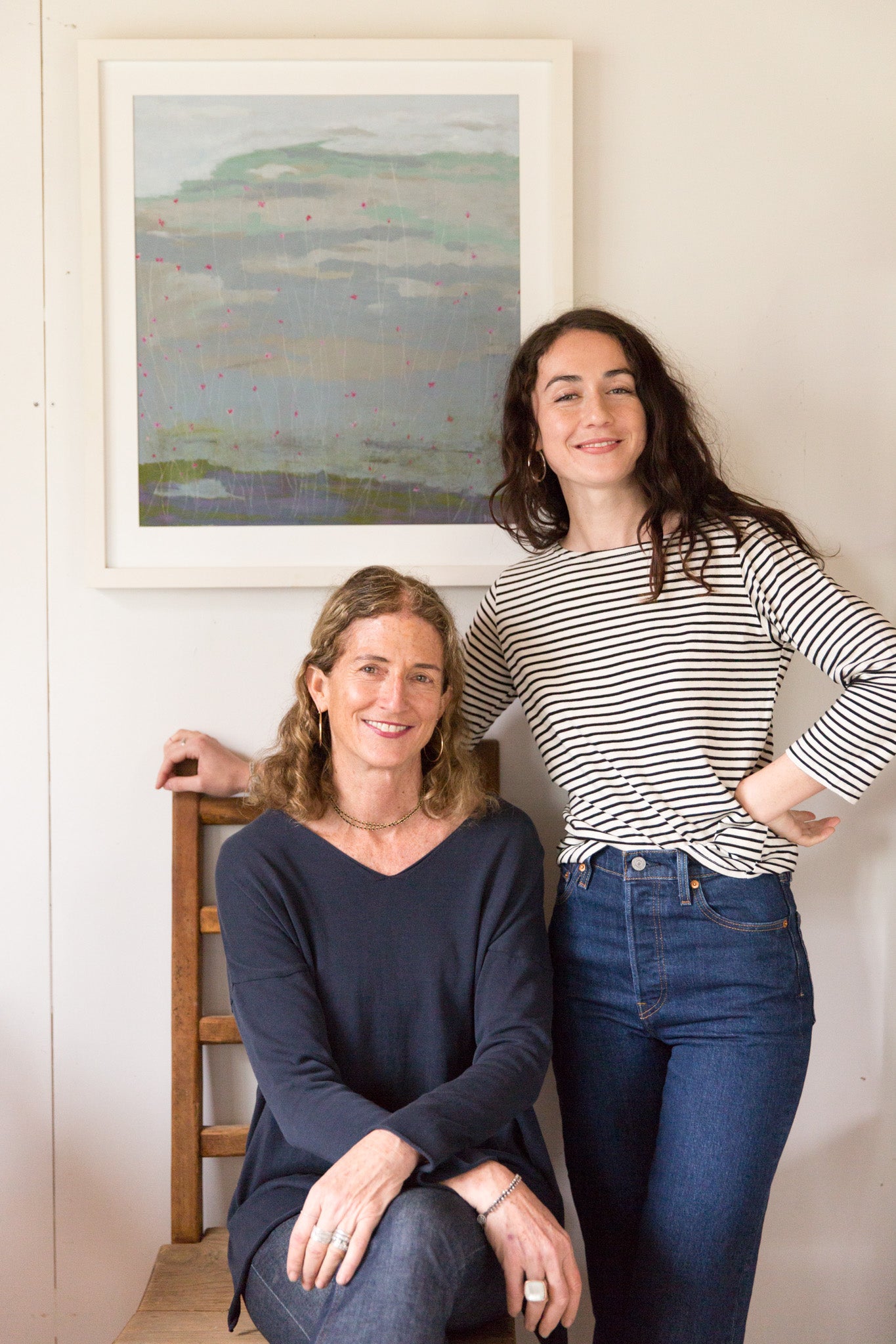 artist, Kate Blakeslee, and daughter, Cecilia Payne, below framed pastel artwork