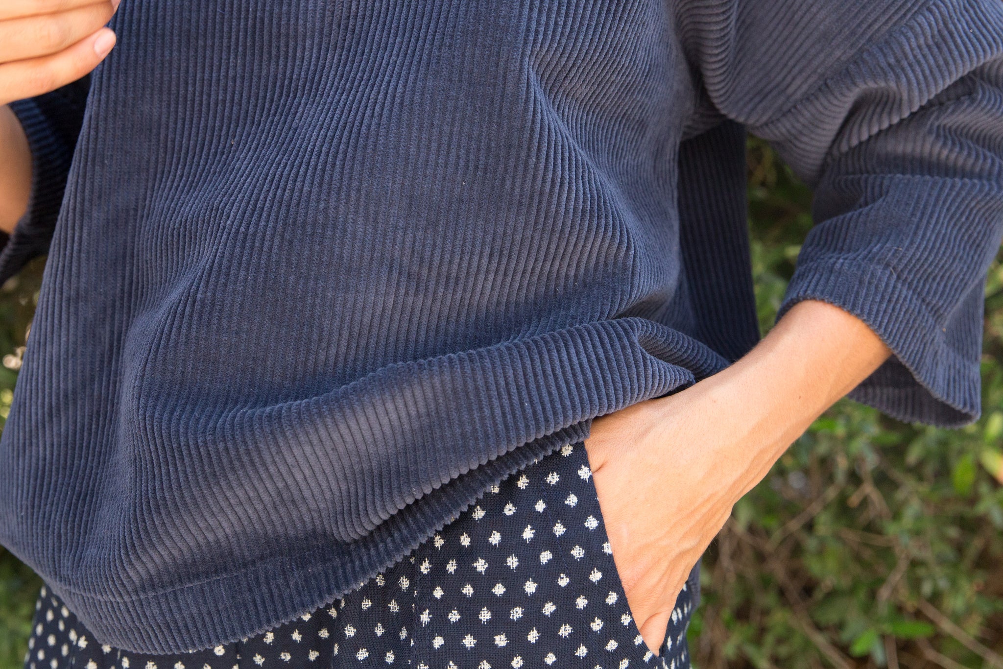 detail of Sugar Candy Mountain corduroy top in navy