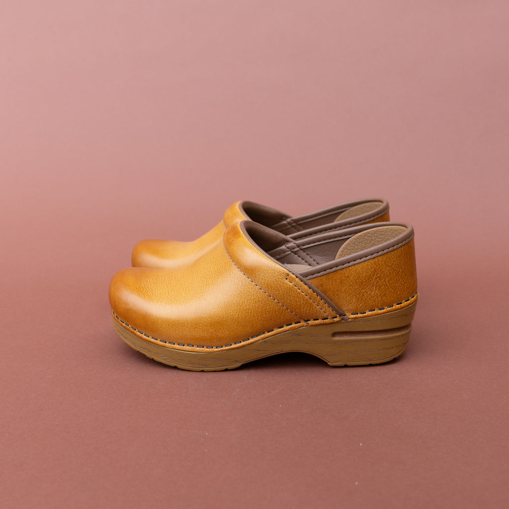 honey distressed dansko clogs