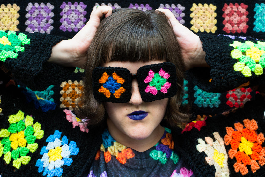 Ashley Zhong modeling her granny square crocheted funny sunnies