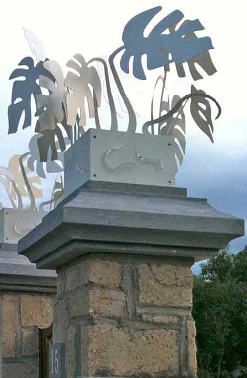 capital lamps for the entrance gate with laser cut aluminum monstera leaves