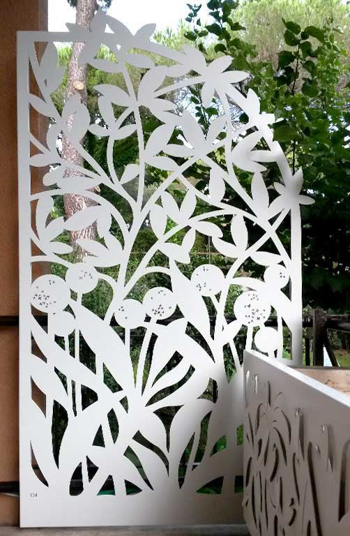 laser cut aluminum panels with a Forest design, enriched by high luminosity LED backlighting