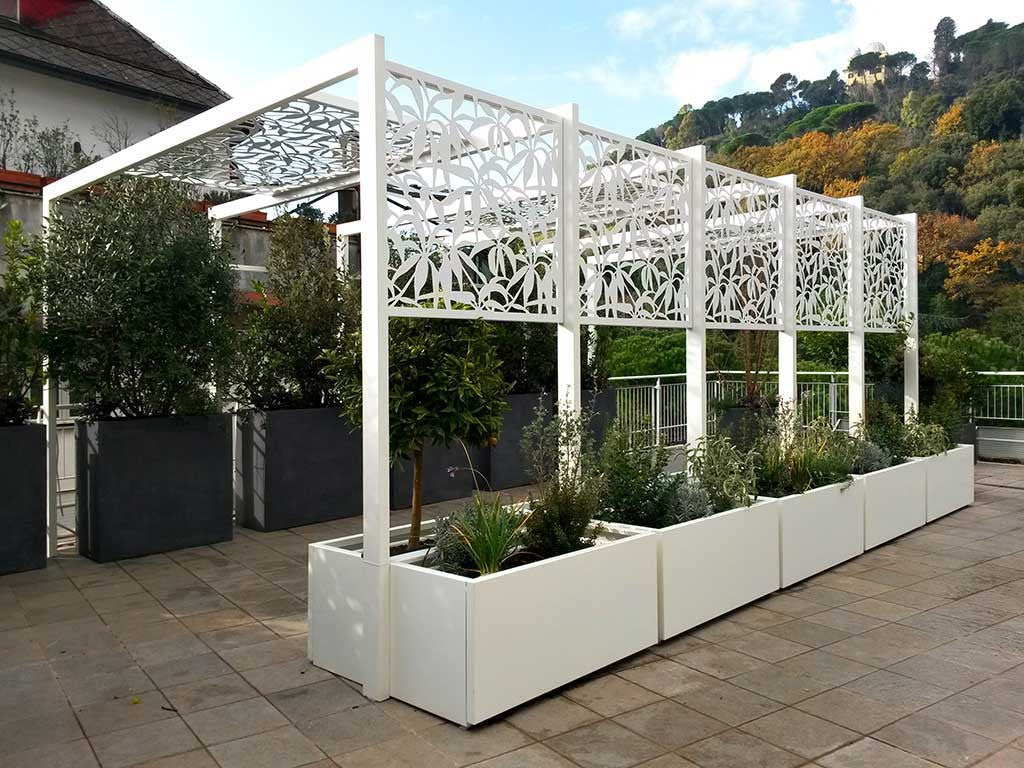 self standing shade structure for outdoor terrace with integrated planters; laser cut aluminum screens