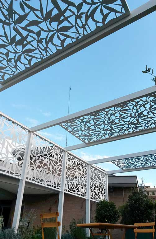 self standing shade structure for outdoor terrace with integrated planters; laser cut aluminum screens