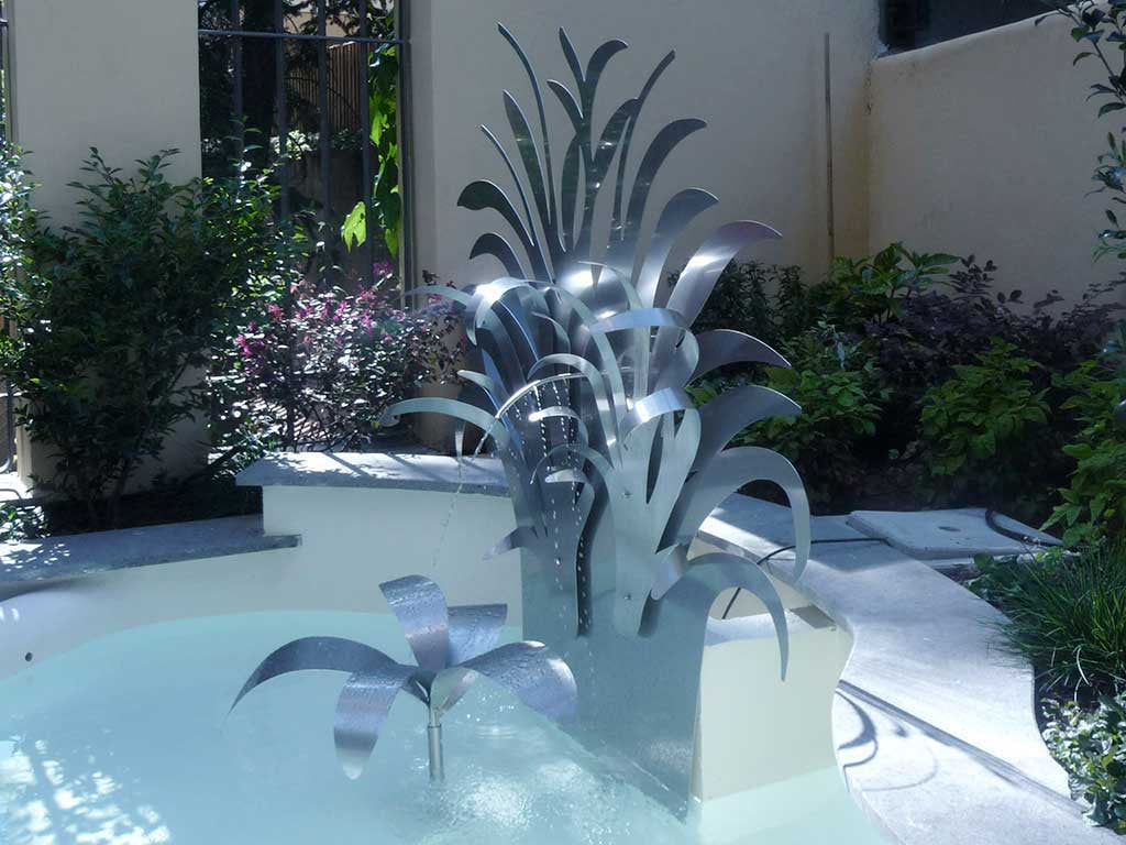 Three layers of stainless steel for a flowering courtyard fountain