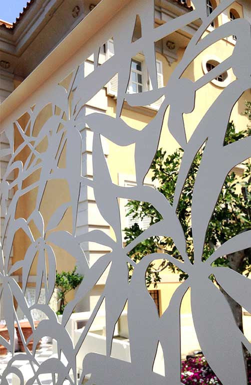 laser cut aluminum screens; perforated railing protecting guests from indiscreet view