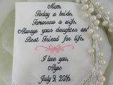 wedding handkerchief with pearls on ivory plate