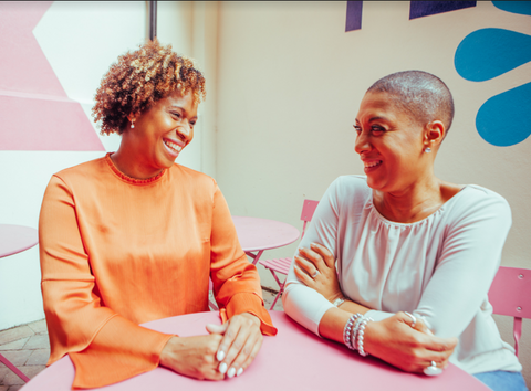 Two black women smiling and hanging out on Valentine's day