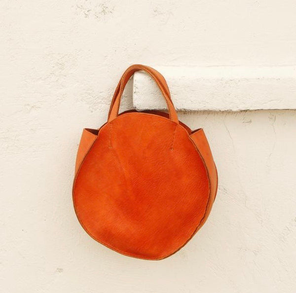 round leather bag