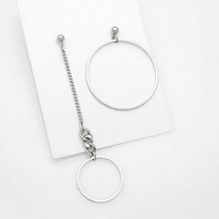 Asymmetric silver earrings at Twelve Silver Trees jewellery 