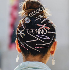 Fall 2019 Hair Trends overload on hair accessories, barrettes, bobby pins, bling clips, gemstones gucci, channel. 