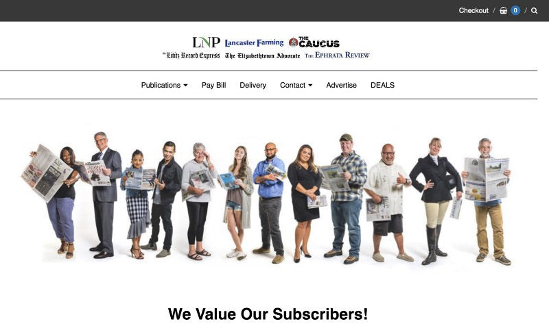 Lancaster online header with a diverse groups of happy subscribers holding their newspapers