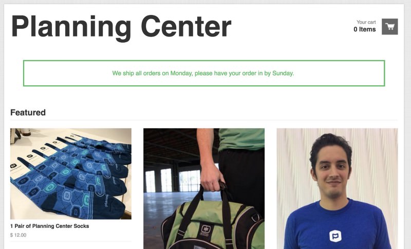 Planning Center store header with featured socks, bag and shirt