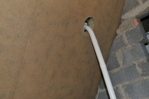 Waterless toilet installation insulation in attic