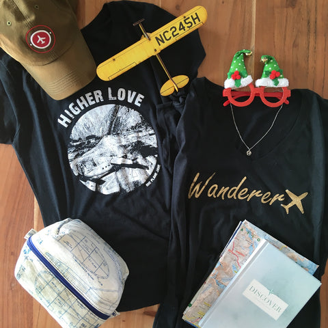 Airplane hat, higher love tee, wanderer tee, cosmetic bag, travel pouch