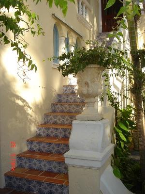 Spanish Caceres Tiles on the Risers Provide Old World Charge