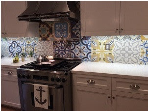 Bright colors and bold patterns found in cement tile are used for this patchwork design.