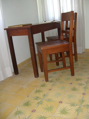 Cement Tile Floor with Artistic Flair Provides Relaxed, Cool Island Feel