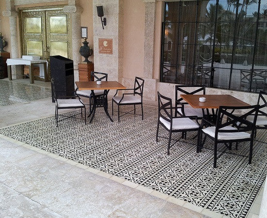 Classic cement tile with stylish rug design