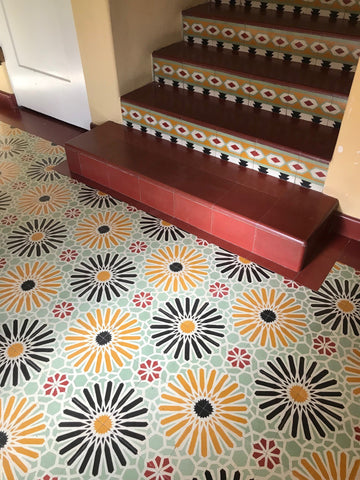 Colorful cement floor tiles are made by hand