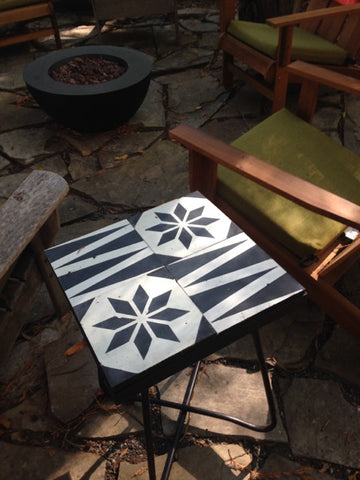 If you have extra cement tiles, use them for an side table