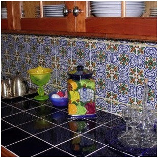 Patterned tile with a border are the right scale for this kitchen.